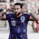 Selebrasi Memphis Depay setelah mencetak gol untuk timnas Belanda ke gawang Lithuania, Senin dini hari WIB (8/9). (Foto: AD)